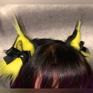 Black and yellow kitten ears